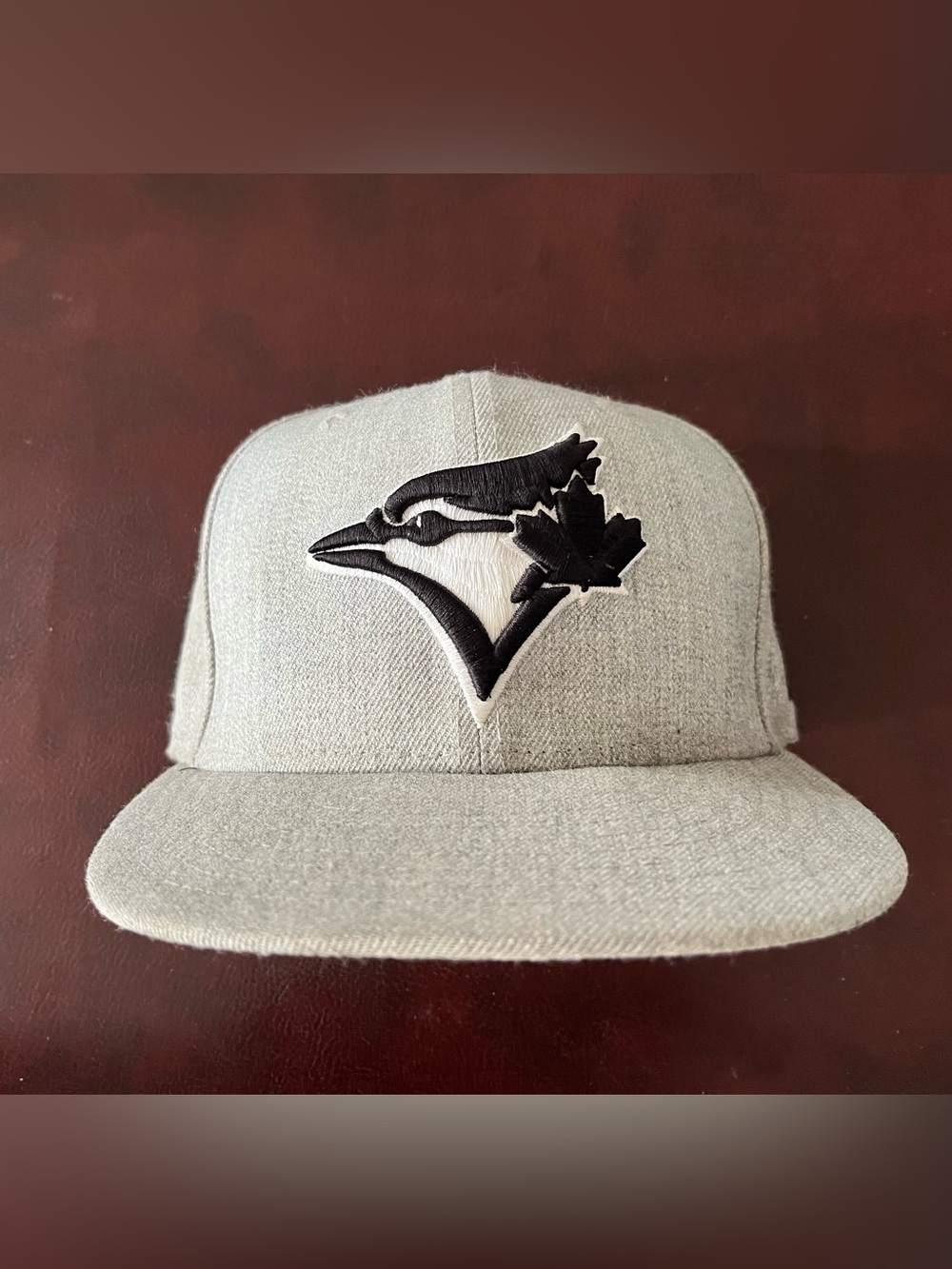 New Era Gray Snapback with Black Toronto Blue Jay Logo